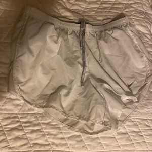 White Nike shorts
